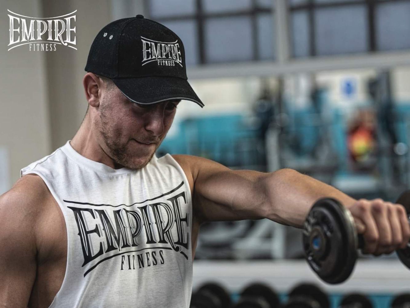 James Whiting lifting a dumbbell at Empire Fitness in Hinckley